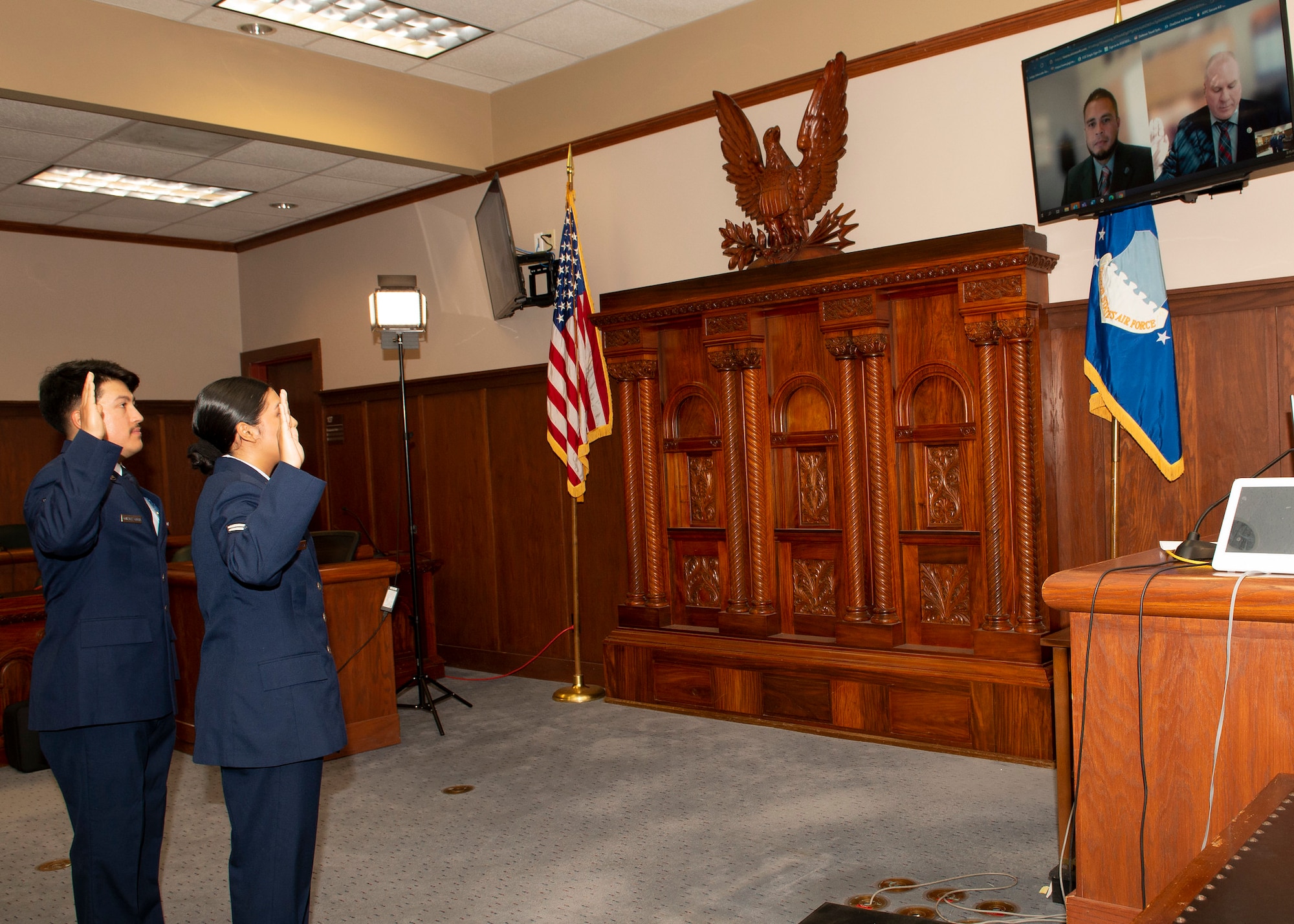 Man and woman swearing in as U.S. citizens