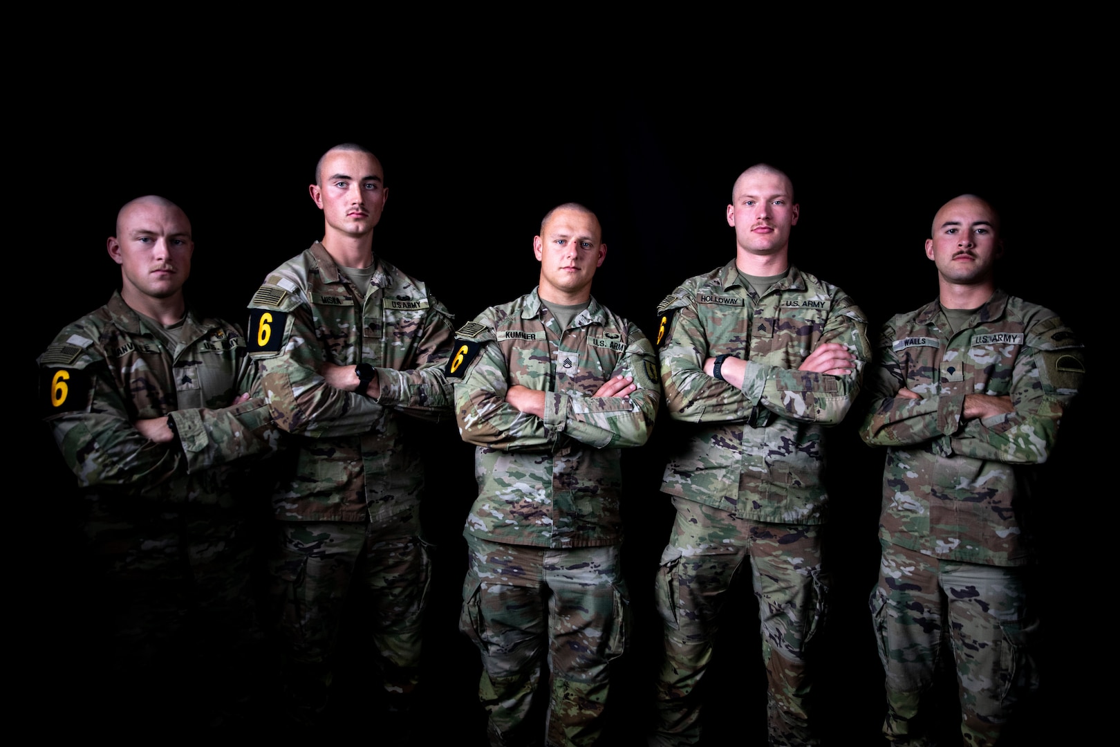 The Army National Guard’s Best Squad competitors pose for a photo at Fort Benning, Georgia, before competing in the U.S. Army’s Best Squad Competition Sept. 29 to Oct. 10, 2022.  From left: Sgt. Austin Manville, New York National Guard; Spc. Nathaniel Miska, Minnesota National Guard; Staff Sgt. Bryan Kummer, Nebraska National Guard; Sgt. Tyler Holloway, Wyoming National Guard, Spc. Wyatt Walls, Oregon National Guard.