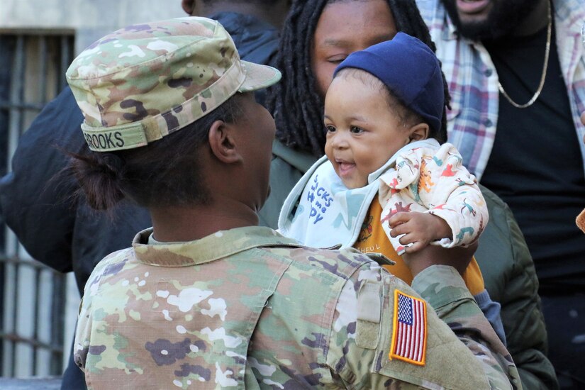 U.S. Soldiers with Headquarters and Headquarters Battalion, 28th Infantry Division, and their families are honored during a deployment ceremony at Zembo Shrine Auditorium. These Soldiers are deploying to the Middle East for a year in support of Operation Spartan Shield.