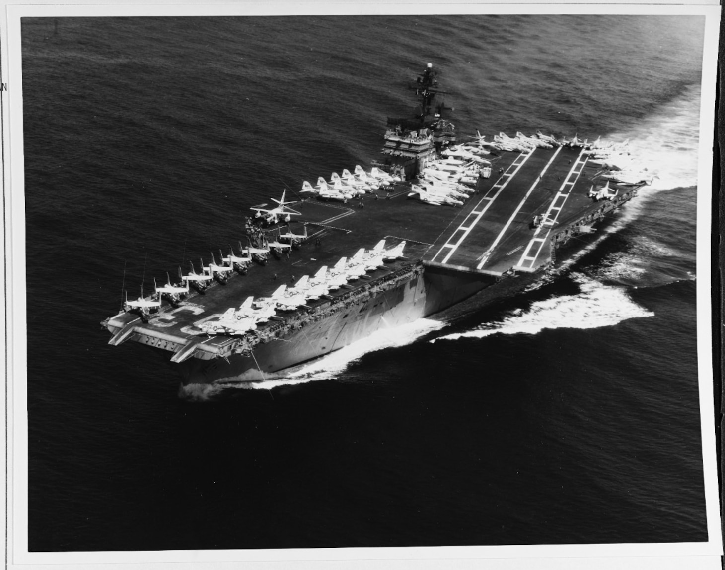 Attack aircraft carrier USS KITTY HAWK (CVA-63) steams the Pacific Ocean 21 July 1969. Photographed by Photographer's Mate First Class D.B. Wood. (USN 1140842)