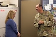 Chief Warrant Officer Charles Harris (left) thanks his wife, Megan, for her support at his retirement lunch on Boone National Guard Center in Frankfort, Ky. on Sept. 30, 2022. Harris is retiring after 39 years of military service as a military intelligence officer. (U.S. Army photo by Andy Dickson)