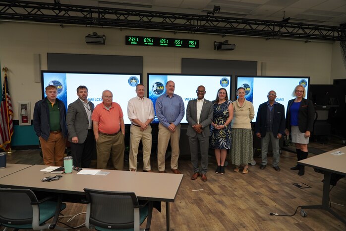 IMAGE: Naval Surface Warfare Center Dahlgren Division (NSWCDD) Strategic and Computing Systems Department hosted a visit from a distinguished group of faculty members from George Mason University (GMU), Sept. 30.

Pictured from right to left: Dr. Michael Bunting, GMU Director of Research Development for National Security, Dr. Luke Martin, NSWCDD Chief Technology Office Director of Collaboration Innovation, Dr. Jeffrey Solka, NSWCDD Senior Scientist Technical Manager for Data Analytics, Steven Canup, Senior Scientist Technical Manager for Cyber Engineering, Frank Dixon, NSWCDD Strategic and Computing Systems Department head, Dr. Andre Marshall, Vice President for Research, Innovation, and Economic Impact, and President of the George Mason Research Foundation, Ann Ruchty, NSWCDD Cyber Technology and Software Systems Division head, Dr. Leigh McCue, GMU Mechanical Engineering Department chair, Dr. Duminda Wijesekera, GMU Department of Cyber Security Engineering chair and Dr. Pearl Rayms-Keller, NSWCDD Strategic and Computing Systems Department chief scientist.