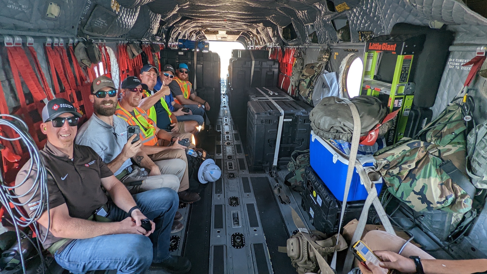 Civilian search and rescue personnel on a CH-47F Chinook helicopter operated by New York Army National Guard Soldiers assigned to B Company, 3rd Battalion, 126th Aviation Regiment, head to a mission on Sanibel Island, Florida, Oct. 2, 2022. At the direction of Gov. Kathy Hochul, the New York National Guard deployed two Chinook helicopters and 11 Soldiers to help the Florida National Guard respond to the destruction caused by Hurricane Ian.