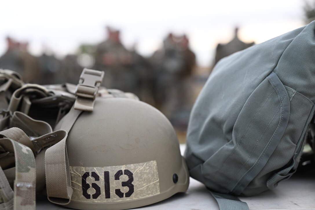 A mission oriented protective posture gas mask pouch and helmet is laid out on a table during the Prime Base Engineer Emergency Force Challenge at Ellsworth Air Force Base, S.D., Sept. 22, 2022.