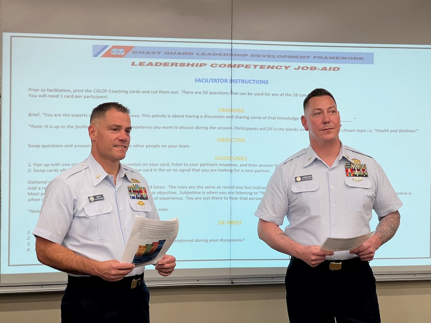 Chief Petty Officer Academy instructors Senior Chief Petty Officer Jacob Zorbaugh Chief Petty Officer Keith Impey test the new Leadership Competency Facilitator Guide in October 2022. (U.C. Coast Guard photo.)
