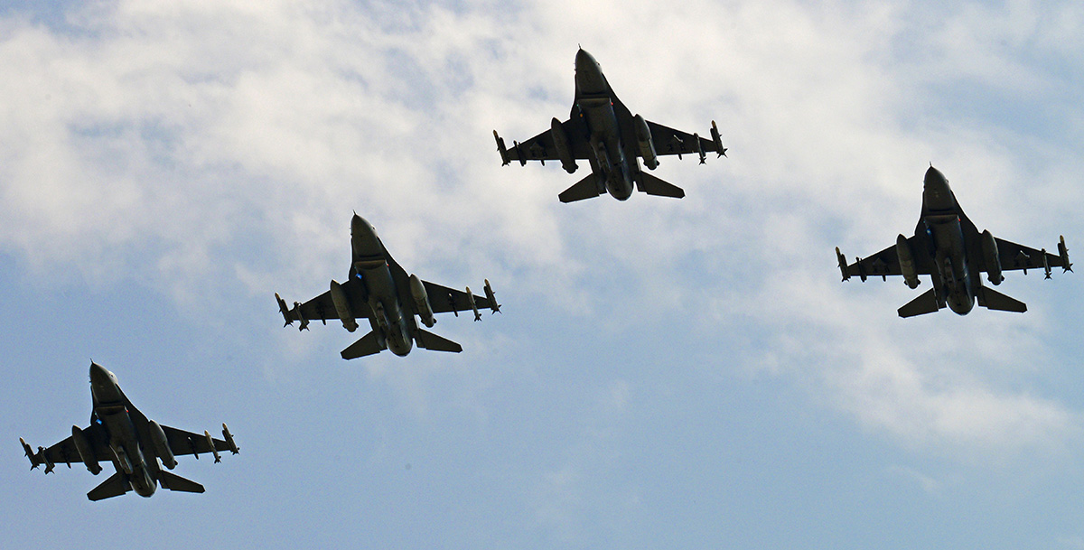 Four ship of F-16's flying.