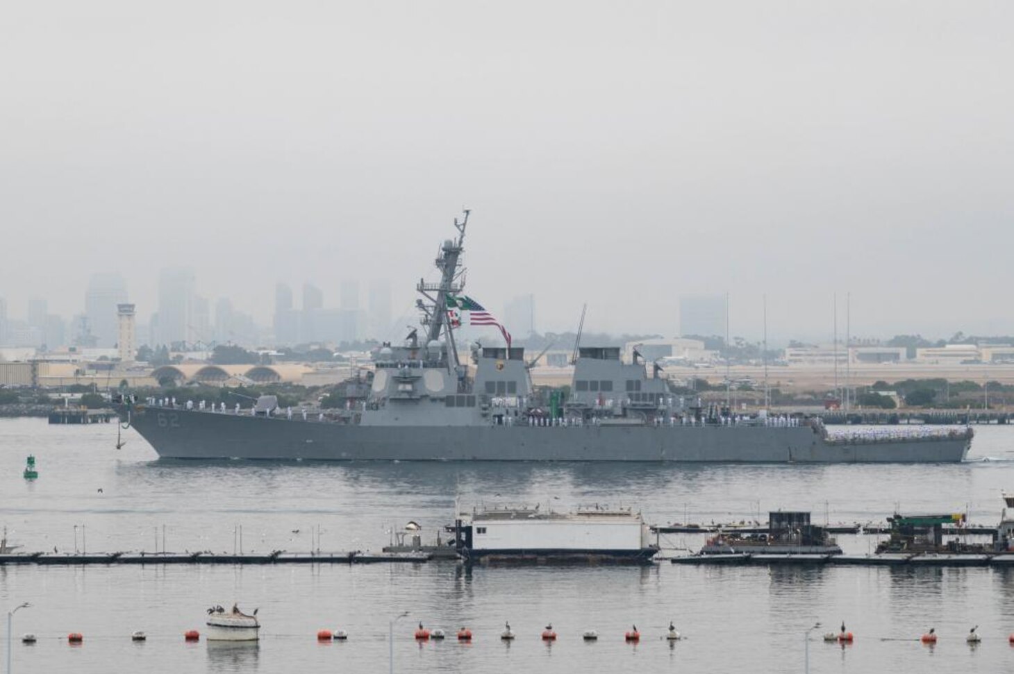 Arleigh Burke-class guided-missile destroyer USS Fitzgerald (DDG 62) returns to homeport, Aug. 23.