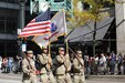 A color guard from the 85th U.S. Army Reserve Support Command, Arlington Heights, Illinois march down State Street during the 70th Annual Columbus Day Parade in Chicago on Monday, October 10, 2022.