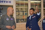 two people in uniform talking