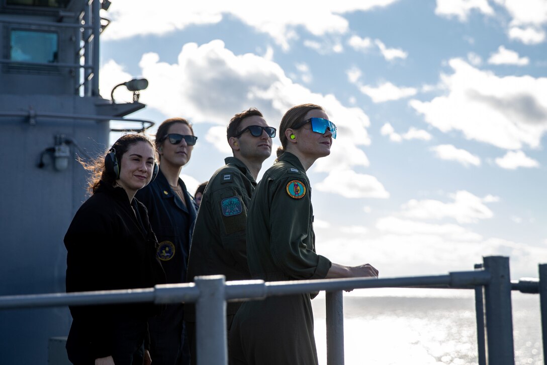 U.S. Navy Sailors assigned to the Wasp-class amphibious assault ship USS Kearsarge, watch harriers depart during flight operations in the Atlantic Ocean, Oct. 7, 2022. The Kearsarge Amphibious Ready Group and embarked 22nd MEU, are operating in U.S. 2nd Fleet in support of naval operations to maintain maritime stability and security across the Atlantic in order to ensure access, deter aggression and defend U.S., allied and partner interests.