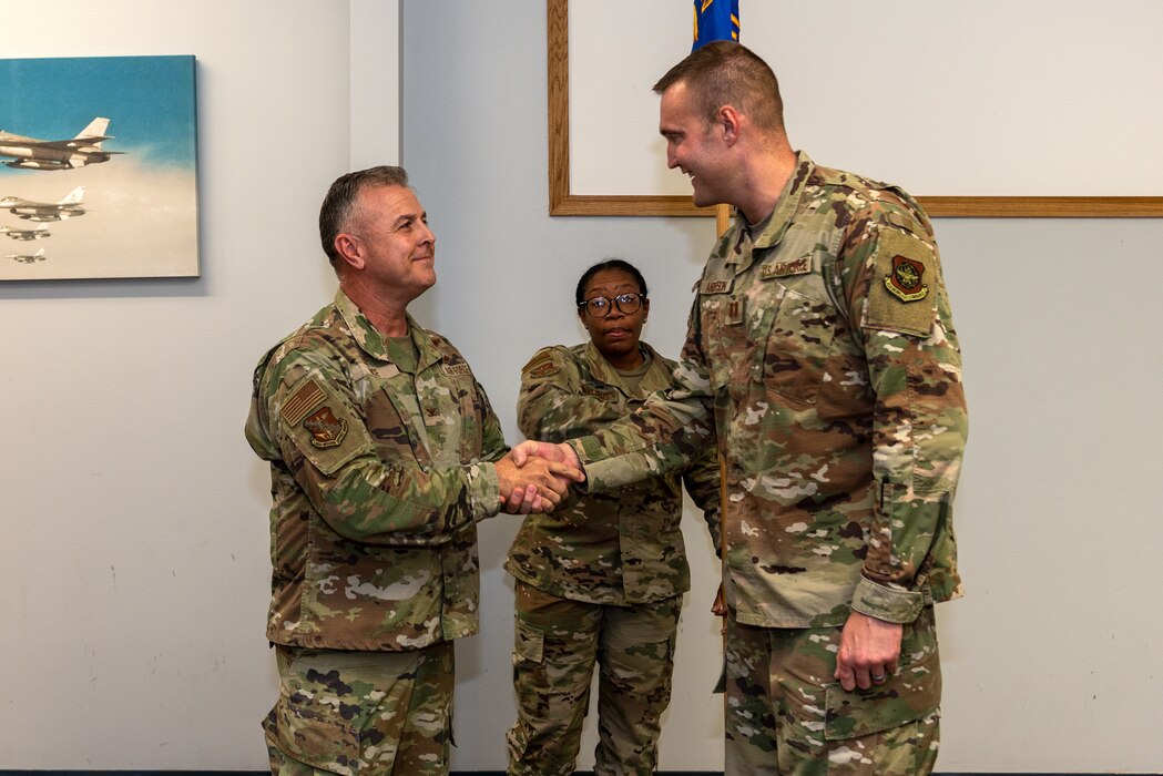 Airmen shaking hands.
