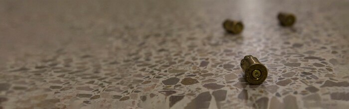 Bullet casings lay on the floor after an active shooter drill at Marine Corps Air Station Cherry Point, North Carolina, Sept. 23, 2020. The exercise simulated an active shooter threat to better prepare base personnel in case of a real-world incident. (U.S. Marine Corps photo by Lance Cpl. Jacob Bertram) Cropped version of original photo VIRIN 200923-M-KY087-1018
