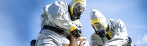 U.S. Marine Corps Staff Sgt. Albert Williams (left), and Staff Sgt. Pierce Draper, both explosive ordnance disposal technicians with Combat Logistics Battalion 11, 11th Marine Expeditionary Unit (MEU), pour bleach solution onto a simulated chemical weapon during chemical, biological, radiological and nuclear response training at Marine Corps Base Camp Pendleton, Calif., Jan. 22, 2020. The solution acts as a decontamination liquid, used to cleanse toxic chemicals from clothing, sites and ordnance. (U.S. Marine Corps photo by Cpl. Dalton S. Swanbeck) Cropped version of VIRIN 200122-M-EC058-1367
