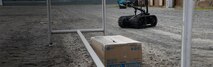 The Talon, an Explosive Ordnance Disposal (EOD) robot, provides visuals to a simulated improvised explosive device (IED) call during a simulated Continental United States IED training, Marine Corps Training Area Bellows, Feb. 21, 2019. EOD conducts this annual training to maintain their readiness. The Maine Corps Base Hawaii EOD team not only supports missions overseas, they work with and assist federal and local law enforcement agencies operations. (U.S. Marine Corps photo by Lance Cpl. Porfirio Gonzalez). Cropped version of 190221-M-KV127-1002