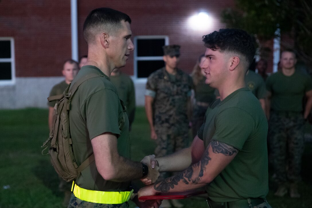 U.S. Marine Corps Lance Cpl. Jacob Shepard, a Brentwood, Tennessee, native and a rifleman with 2d Battalion, 8th Marine Regiment, 2d Marine Division, participates in his reenlistment ceremony on Camp Lejeune, North Carolina, Oct. 7, 2022. Shepard’s reenlistment demonstrates his fidelity and commitment to the United States Marine Corps. (U.S. Marine Corps photo by Cpl. Michael Virtue)