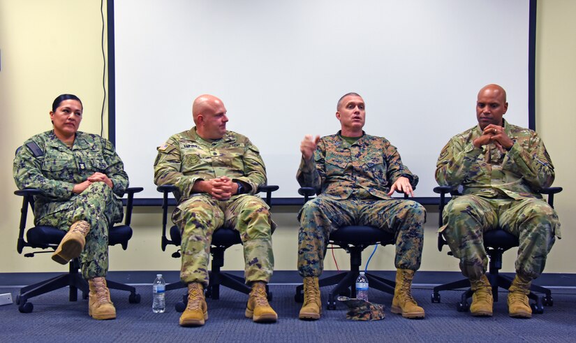 Senior enlisted leadership lectures students in classroom.