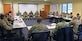 Senior enlisted leadership talks to students in classroom.