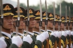 People’s Liberation Army soldiers participate in a welcome ceremony during a meeting between then–Chairman of the Joint Chiefs of Staff Joseph F. Dunford, Jr., and his Chinese counterpart, General Fang Fenghui, at the Ba Yi, August 15, 2017 (DOD/Dominique A. Pineiro)