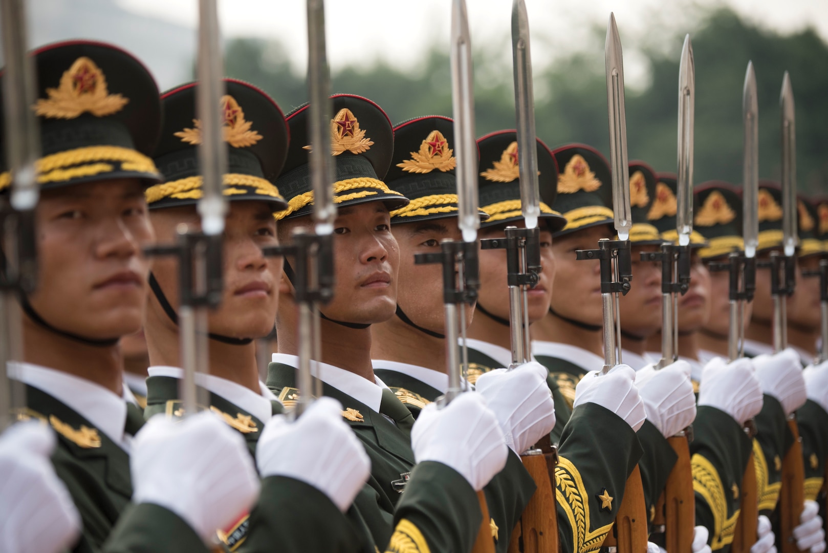 People’s Liberation Army soldiers participate in a welcome ceremony during a meeting between then–Chairman of the Joint Chiefs of Staff Joseph F. Dunford, Jr., and his Chinese counterpart, General Fang Fenghui, at the Ba Yi, August 15, 2017 (DOD/Dominique A. Pineiro)
