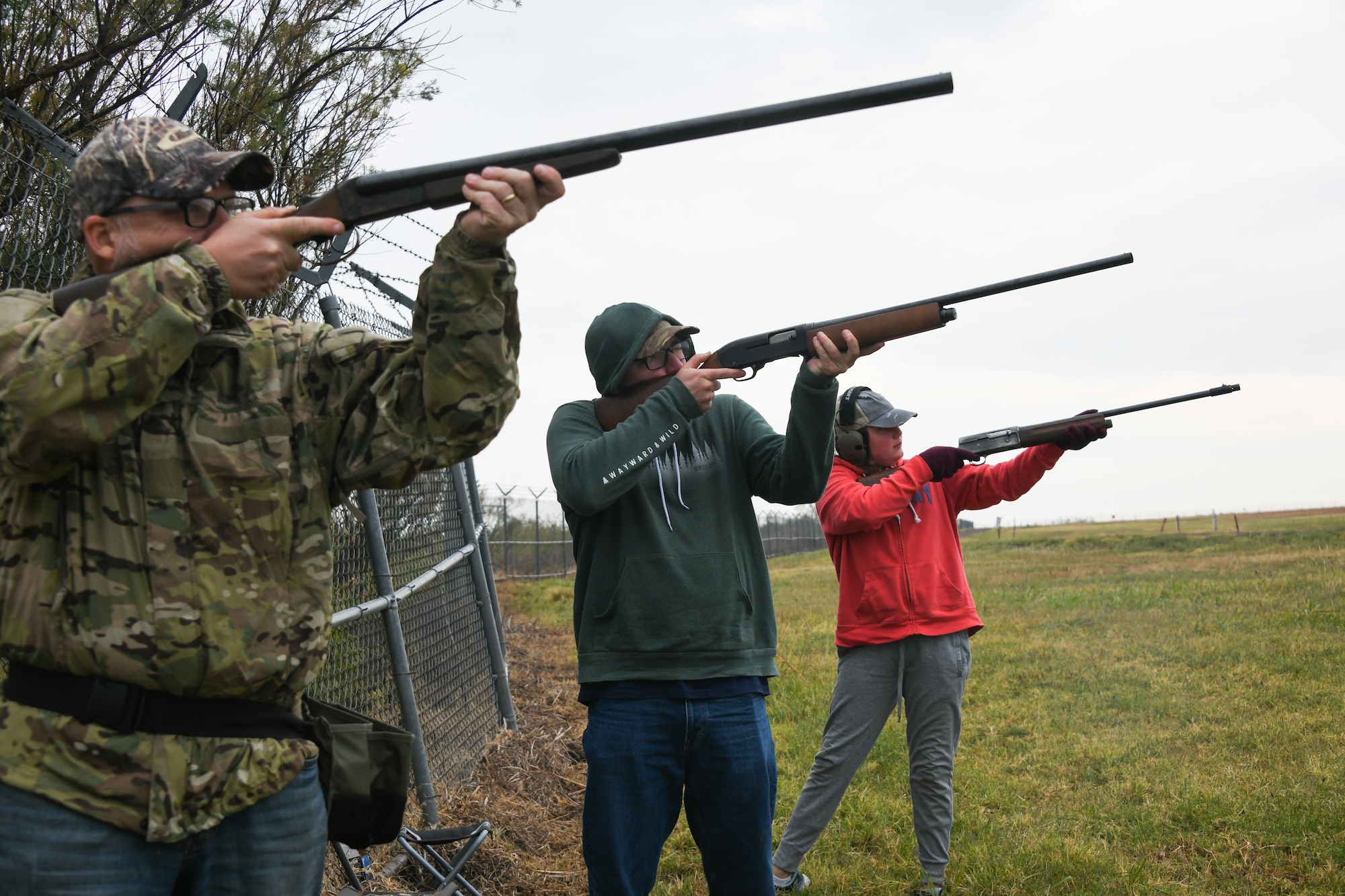 Members of Altus Air Force Base prepare to fire during a dove hunt at Altus Air Force Base, Oklahoma, Oct. 8, 2022. The event is held annually in partnership with the Oklahoma Department of Wildlife Conservation to promote responsible hunting. (U.S. Air Force photo by Airman 1st Class Miyah Gray)