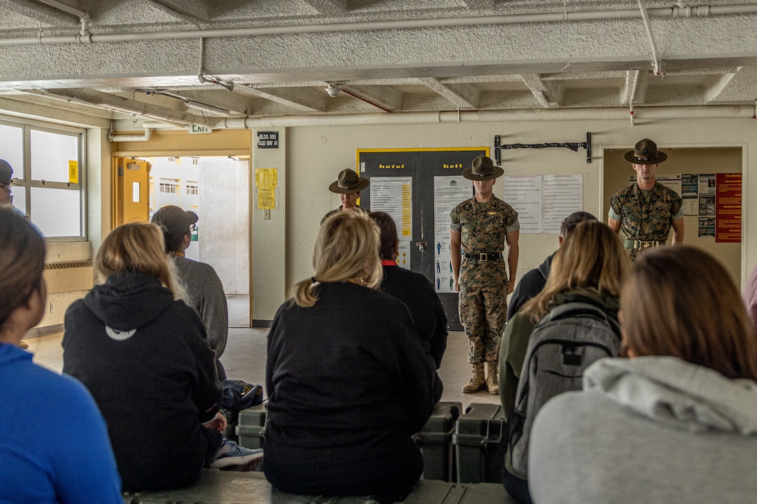 Educators with Recruiting Station Riverside and Recruiting Station San Diego, witness a mock pick-up during the Educators' Workshop at Marine Corps Recruit Depot San Diego, California, July 12, 2022. The Educators' Workshop is a five-day program designed to better inform high school and college teachers, coaches, counselors, and influencers about the benefits and opportunities available during service in the Marine Corps. This allows attendees to return home and provide firsthand experience and knowledge to individuals interested in military service. (U.S. Marine Corps photo by Sgt. Ana S. Madrigal)