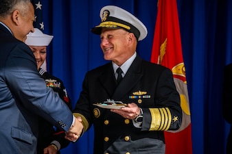 WASHINGTON (Oct. 12, 2022) Secretary of the Navy Carlos Del Toro shakes hands with Chief of Naval Operations Adm. Mike Gilday at a cake cutting ceremony for the Navy's 247th birthday celebration at the Pentagon, Oct. 12. The theme for this year’s birthday celebration is "On Watch - 24/7 for 247 Years." (U.S. Navy photo by Mass Communication Specialist 1st Class Michael B Zingaro/released)