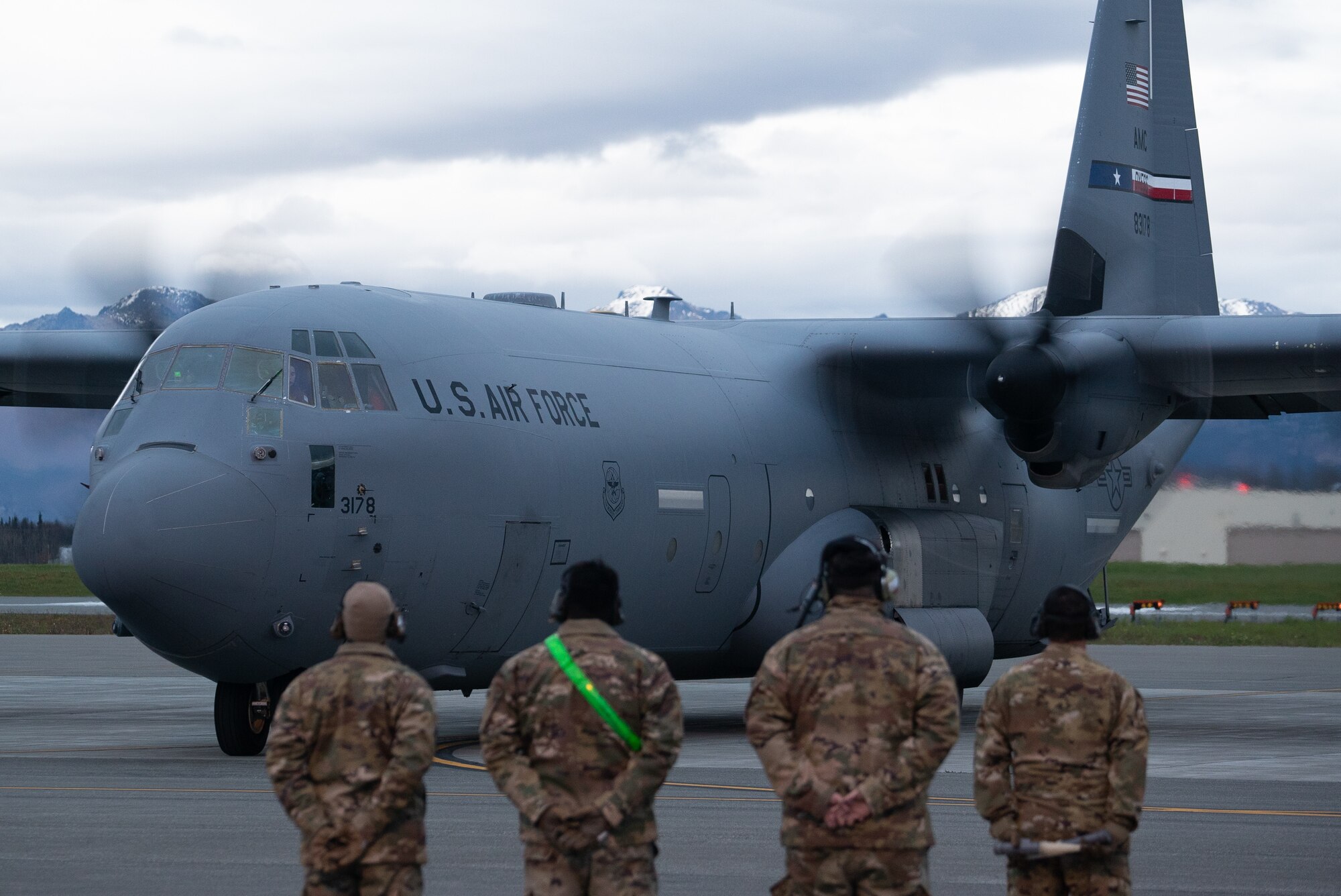 Photo of Airmen and C-130J Super Hercules