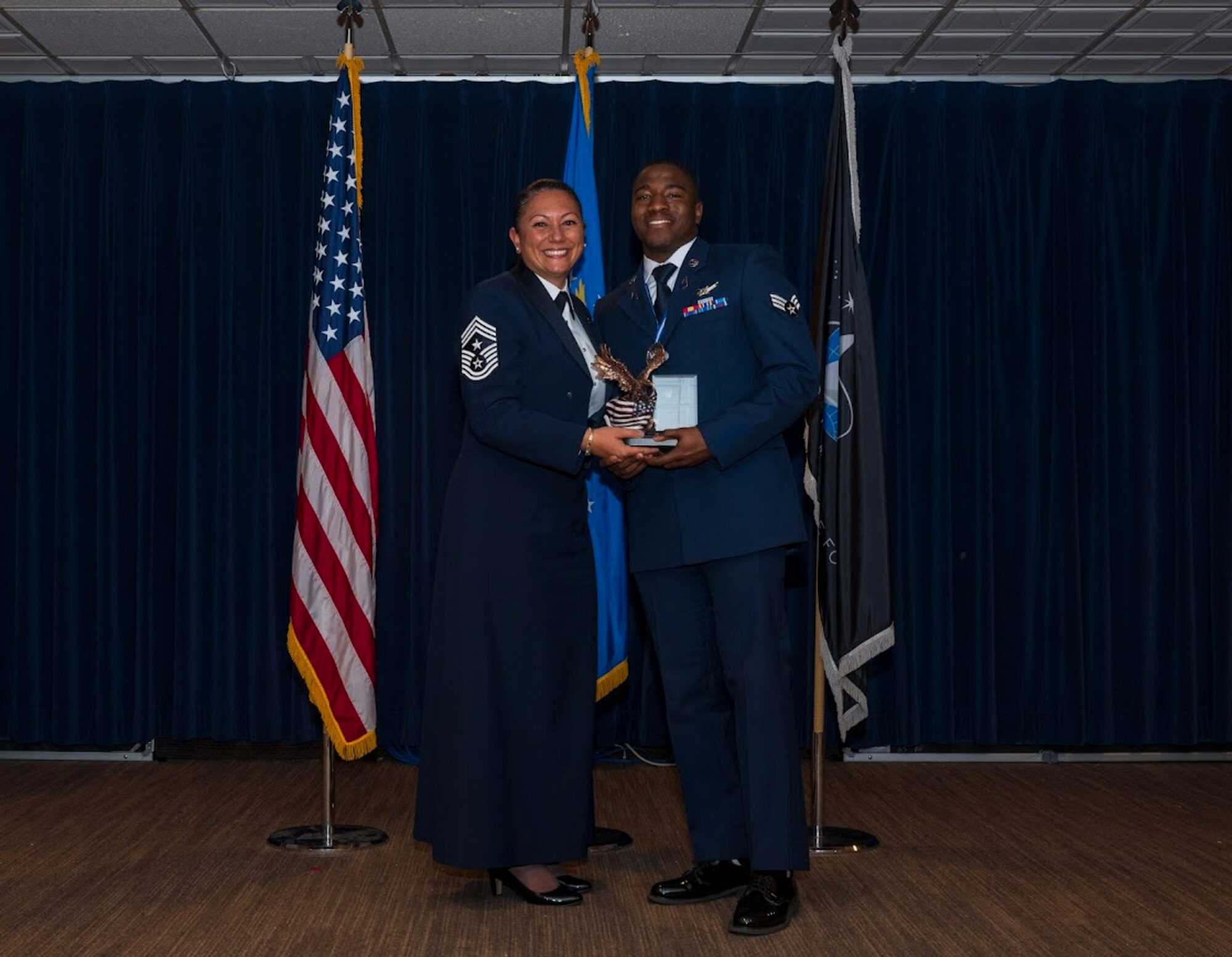 Chief Balkuvvar and Spc. 4 Griffin pose for a photo