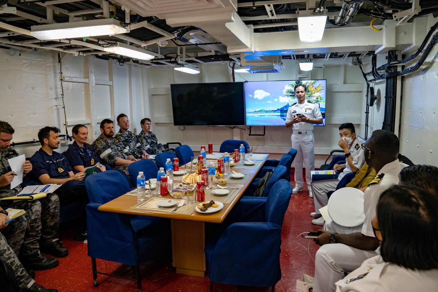 Members of the Japan Maritime Self-Defense Force and Sailors from the Philippine Navy, Royal Australian Navy, Royal Navy, and U.S. Navy, attend a brief aboard BRP Jose Rizal (FF 150) during Exercise Sama Sama-Lumbas 2022, Oct. 11. Sama Sama-Lumbas is a multilateral exercise and includes forces from Philippines, the United States, Australia, France, Japan, and the United Kingdom designed to promote regional security cooperation, maintain and strengthen maritime partnerships, and enhance maritime interoperability.