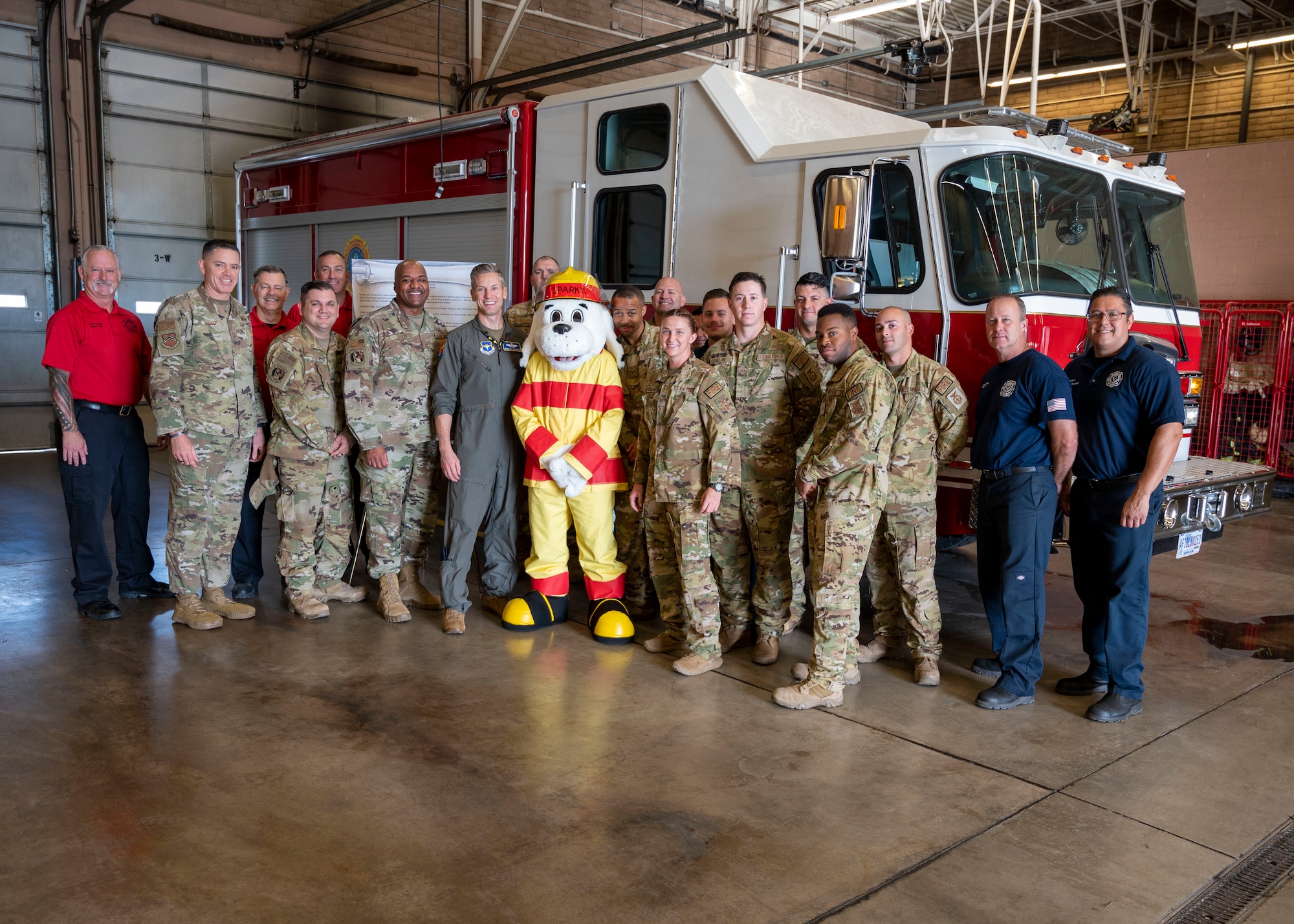Senior leadership from the 56th Fighter Wing and 56th Civil Engineer Squadron firefighters, Airmen and “Sparky” kick off this year’s Fire Prevention Week Oct. 7, 2022, at Luke Air Force Base, Arizona.