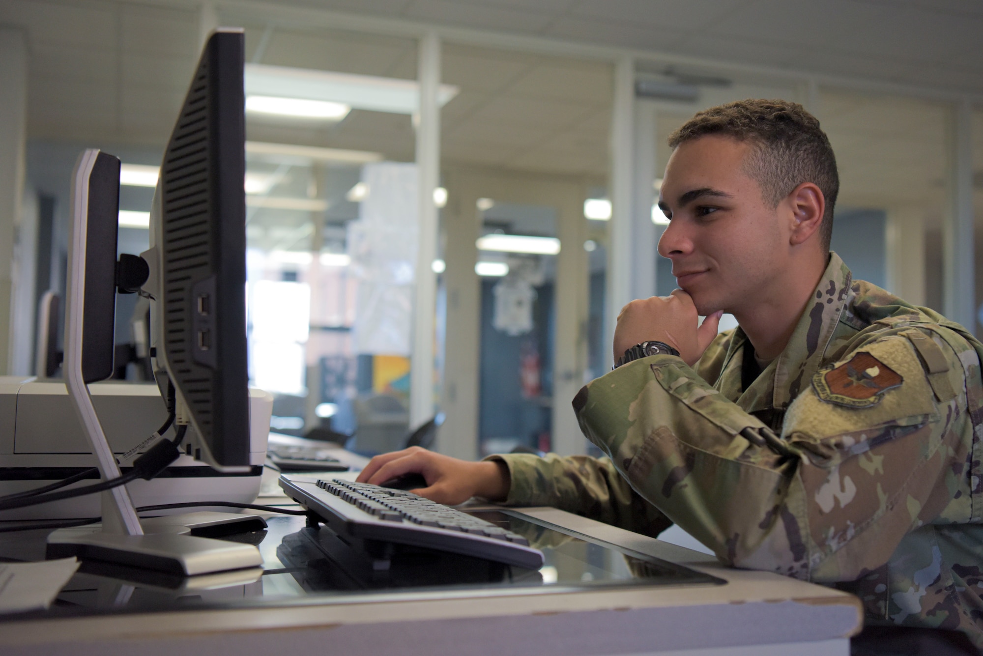 U.S. Air Force Airman 1st Class Branden Valle, 315th Training Squadron student, studies at a computer, Goodfellow Air Force Base, Texas, October 11th, 2022. Valle is training to become an operations intelligence specialist. (U.S. Air Force photo by Senior Airman Michael Bowman)