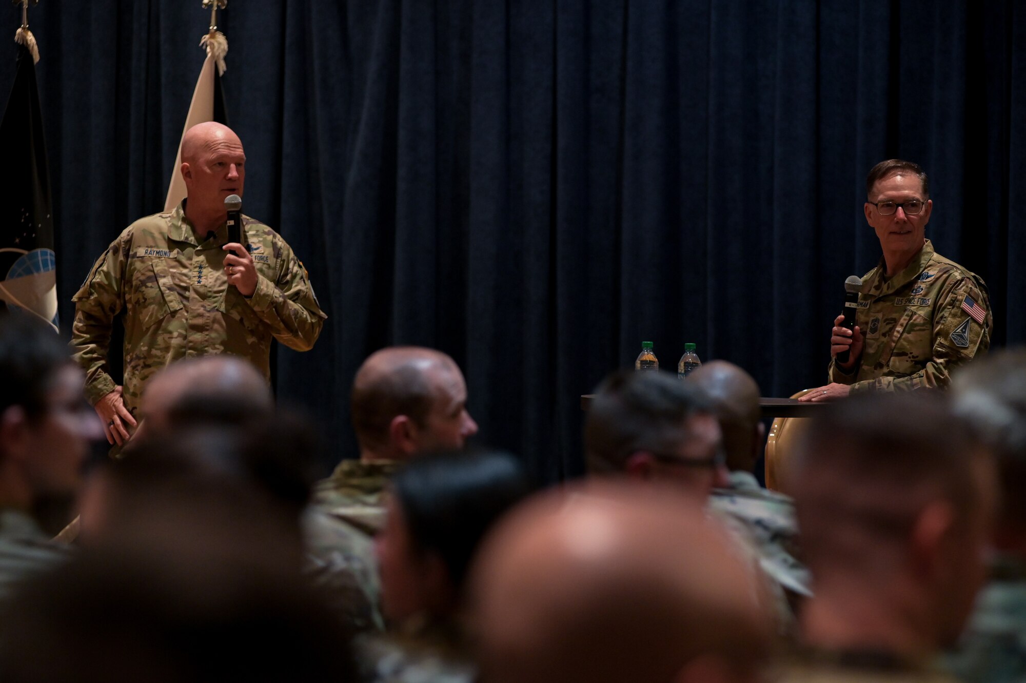 U.S. Space Force Gen. John "Jay" Raymond, Chief of Space Operations, and U.S. Space Force Chief Master Sgt. Roger Towberman, Chief Master Sgt. of the Space Force, discusses the importance of space and the cruciality of the Guardians that make assured access to space possible on Oct. 11, 2022, at Vandenberg Space Force Base, Calif. Gen. Raymond spoke about these matters during an all-call located on base. (U.S. Space Force photo by Airman First Class Rocio Romo)