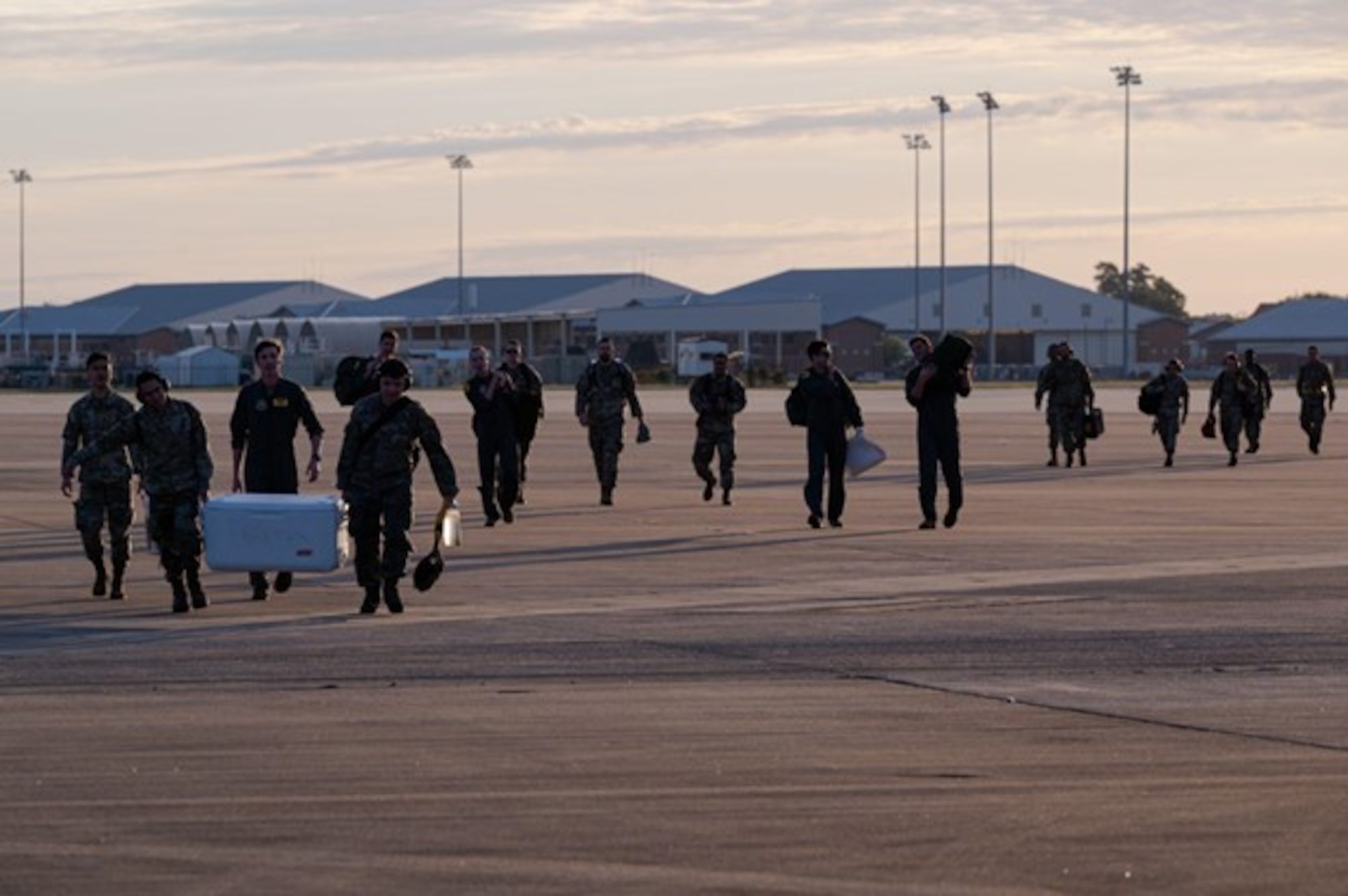 Airmen assigned to the 1st Fighter Wing approach a C-17 Globemaster before a training mission on Joint Base Langley-Eustis, V.A., Sept. 27, 2022.