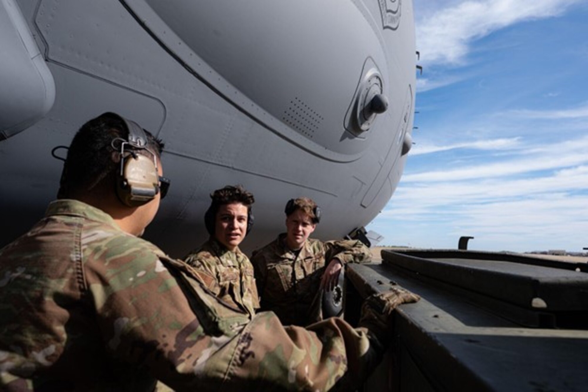 Airmen assigned to the 305th Aircraft Maintenance Squadron and the 621st Contingency Response Wing prepare a C-17 Globemaster for flight on Joint Base Langley-Eustis, V.A., Sept. 28, 2022.