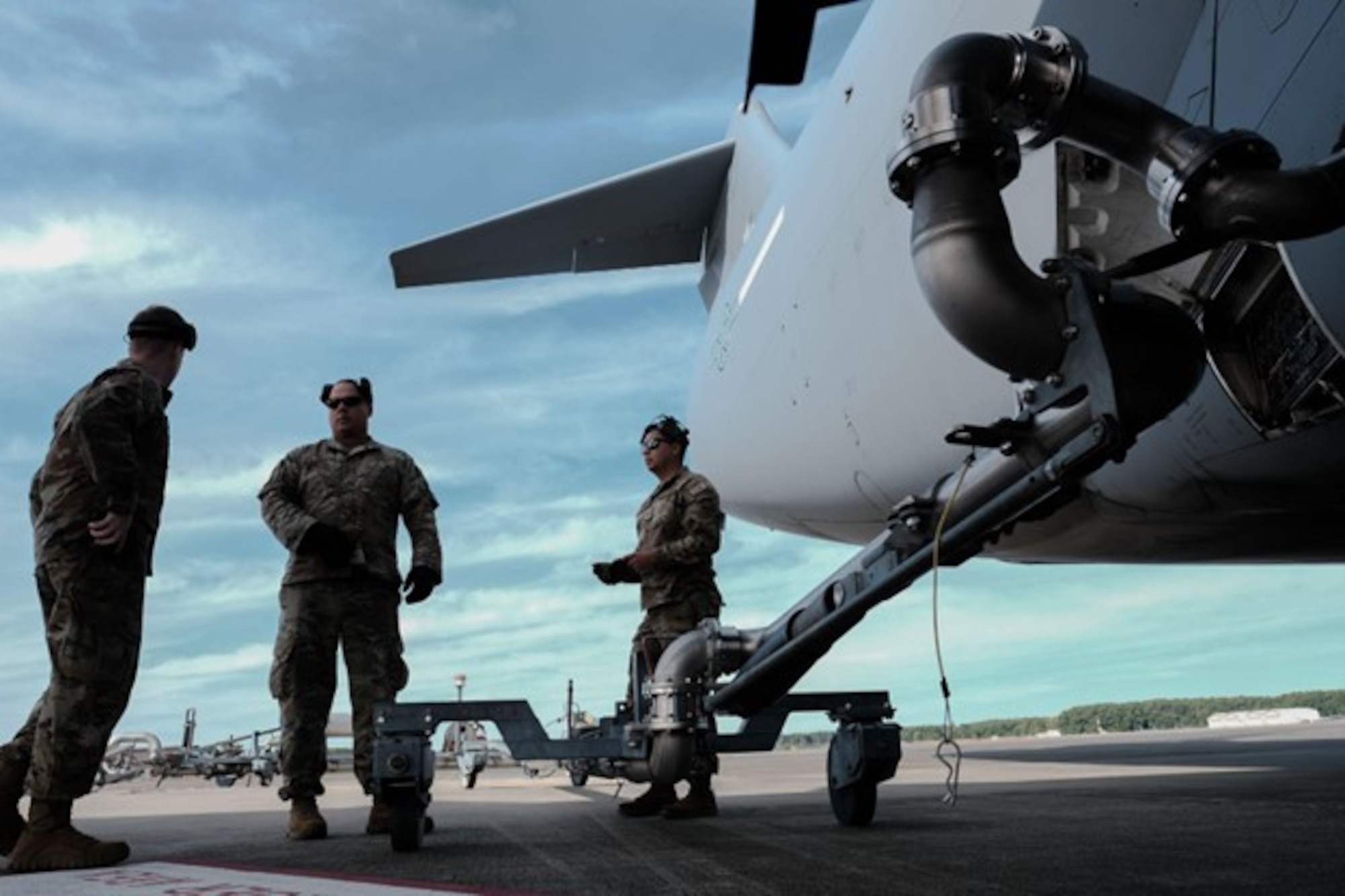 Airmen assigned to the 305th Aircraft Maintenance Squadron and 621st Contingency Response Wing refuel a C-17 Globemaster prior to a tactical sortie on Joint Base Langley-Eustis, V.A., Sept. 28, 2022.