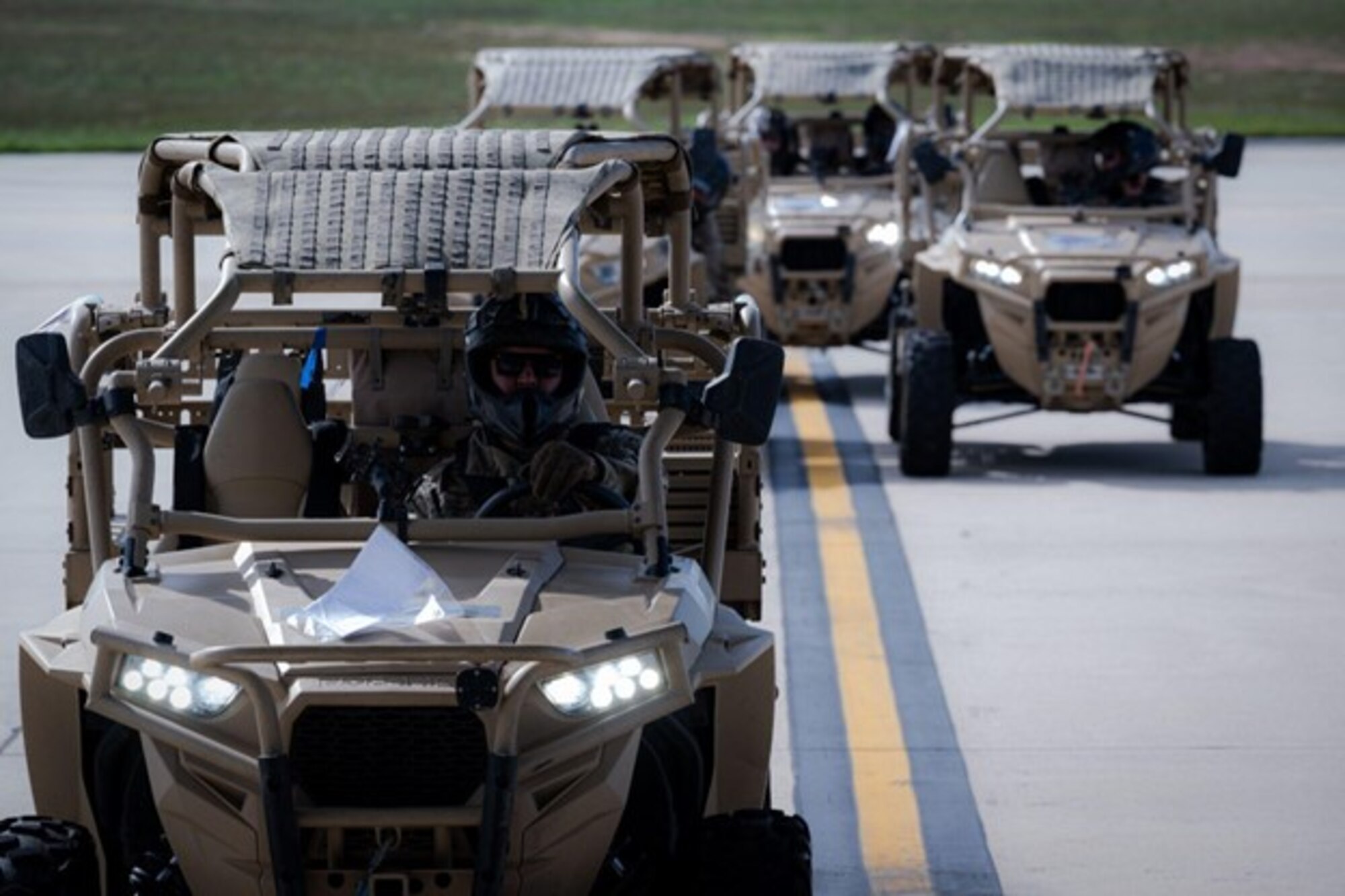Airmen assigned to the 621st Contingency Response Wing drive Polaris MRZR Diesel tactical off-road vehicles onto a C-17 Globemaster on Joint Base McGuire-Dix-Lakehurst, N.J., Sept. 29, 2022.