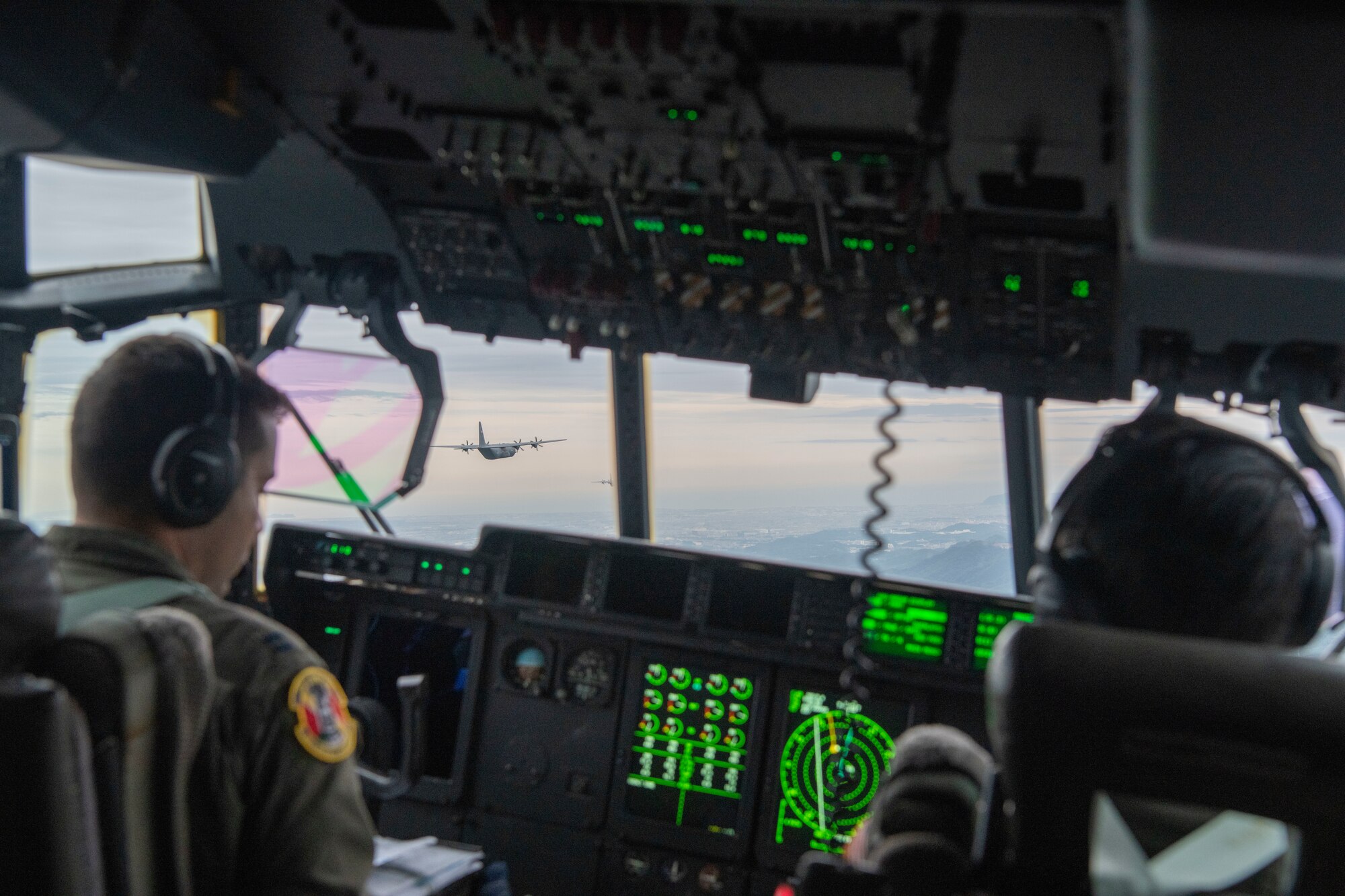 U.S. Air Force pilots fly in a formation