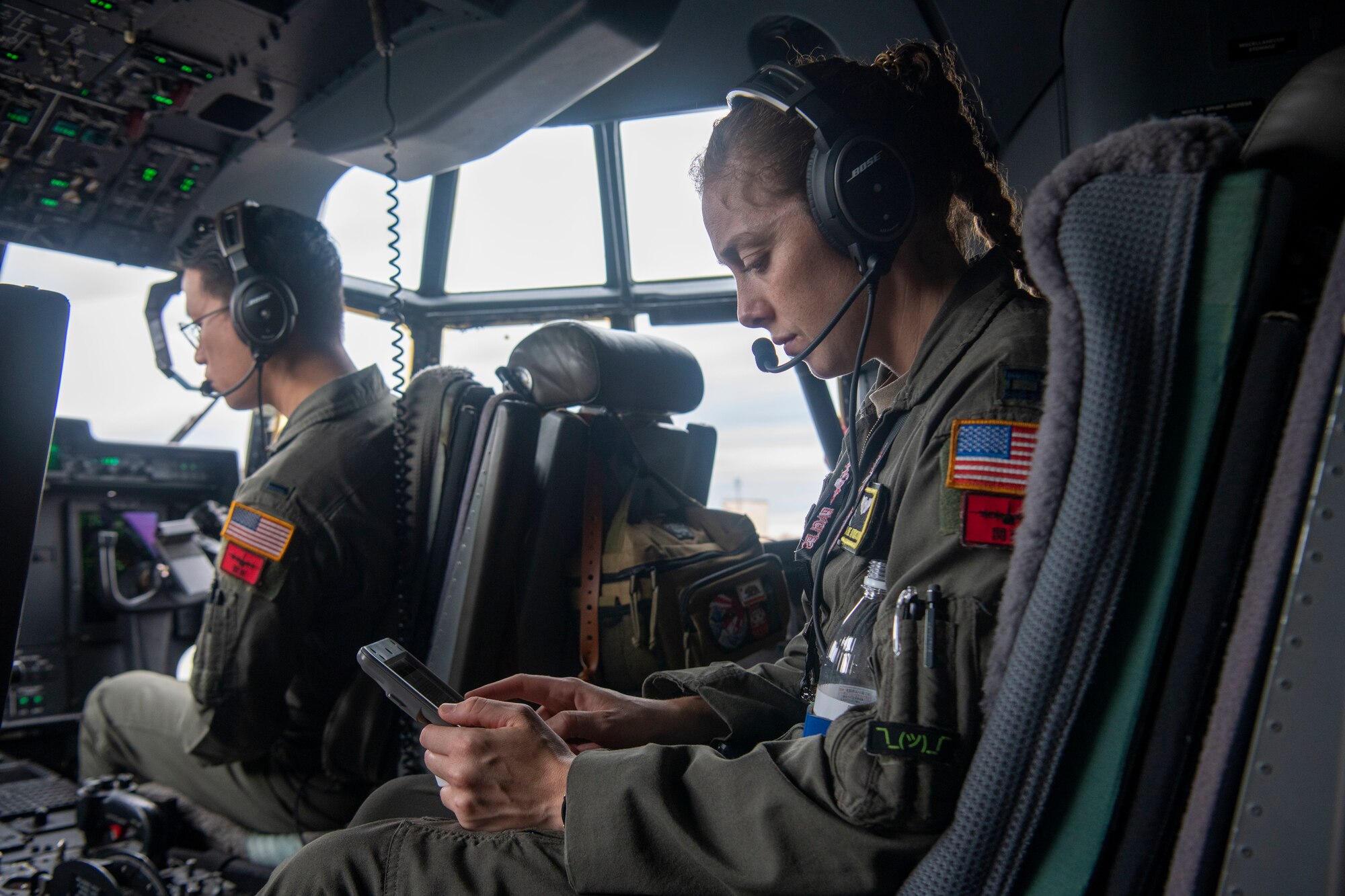 A pilot conducts preflight procedures before a flight