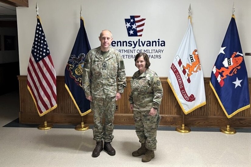 Brig. Gen. Arturas Radvilas, left, Lithuanian Land Forces commander, and Brig. Gen. Laura McHugh, deputy adjutant general-Army, Pennsylvania National Guard, pose for a photo at the Pennsylvania National Guard Joint Force Headquarters at Fort Indiantown Gap, Pa., on Oct. 9, 2022. Radvilas, along with Brig. Gen. Modestas Petrauskas, Lithuanian defense attaché to the United States and Canada, and Command Sgt. Maj. Darius Masiulis, Lithuanian Land Forces command sergeant major, visited Fort Indiantown Gap and attended the 28th Infantry Division departure ceremony in Harrisburg on Oct. 9.