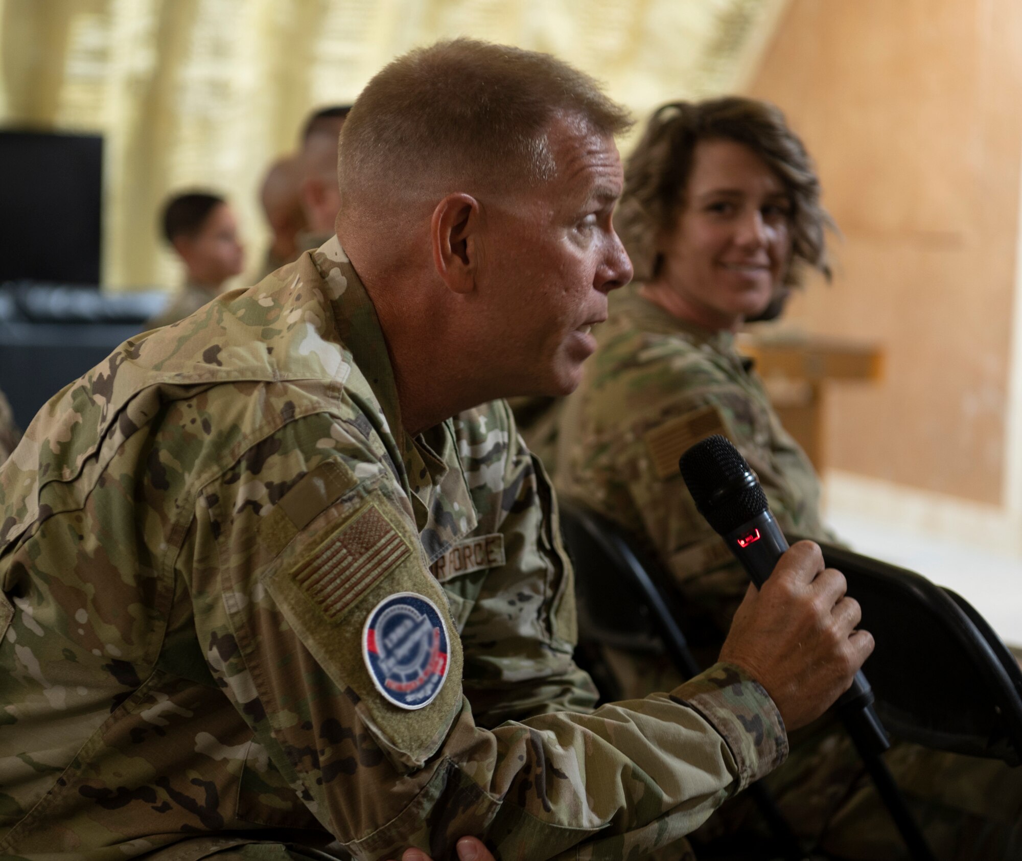 The 332d Air Expeditionary Wing 5/6 Council holds A Reverse Mentorship panel at an undisclosed location in Southwest Asia, September 30, 2022. The panel included ten up-and-coming Airmen answering leadership questions on how to improve relations between junior enlisted Airmen and senior enlisted leadership. (U.S. Air Force photo by Tech. Sgt. Jeffery Foster)