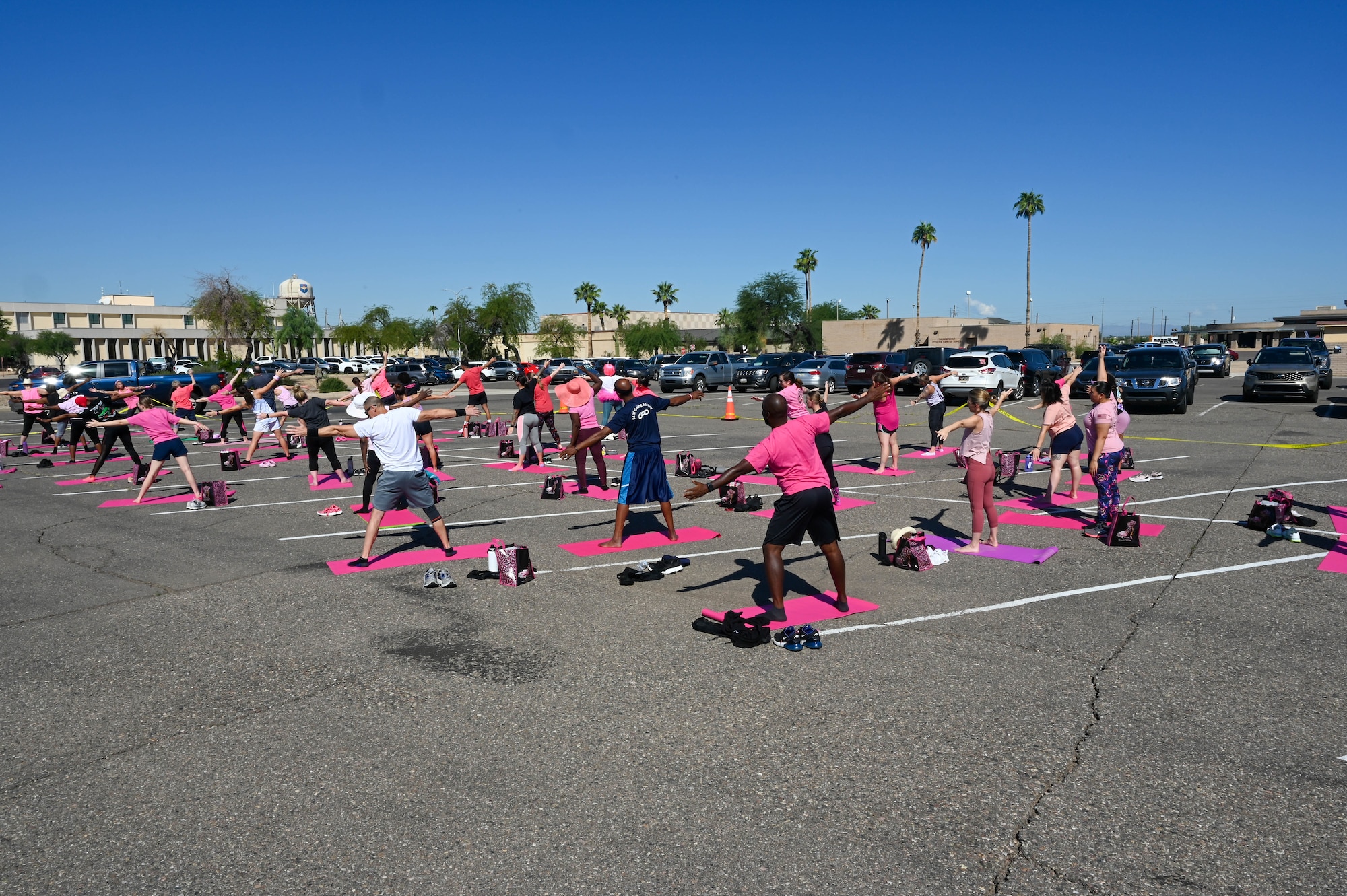 Members of the Luke Air Force Base community participate in a yoga session Oct. 5, 2022, at Luke Air Force Base, Arizona.