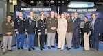 A group of DLA employees pose for a photo.