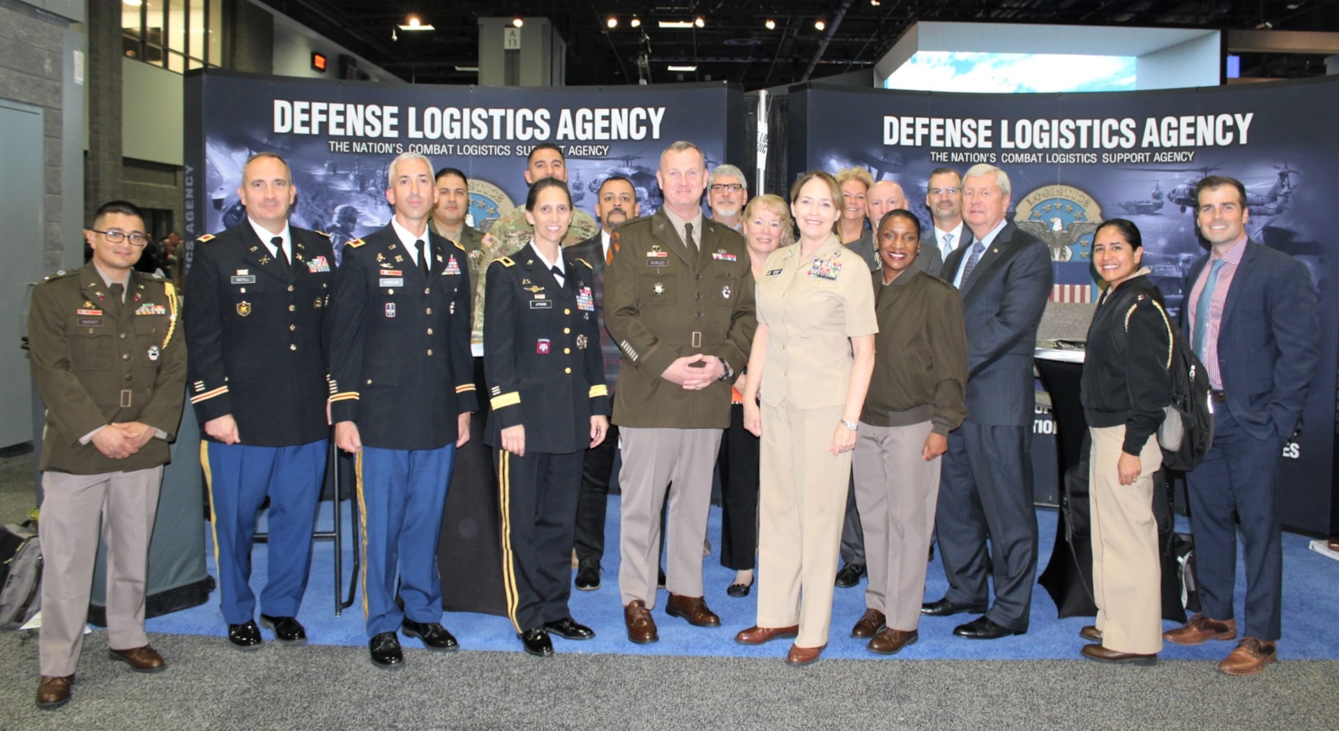 A group of DLA employees pose for a photo.