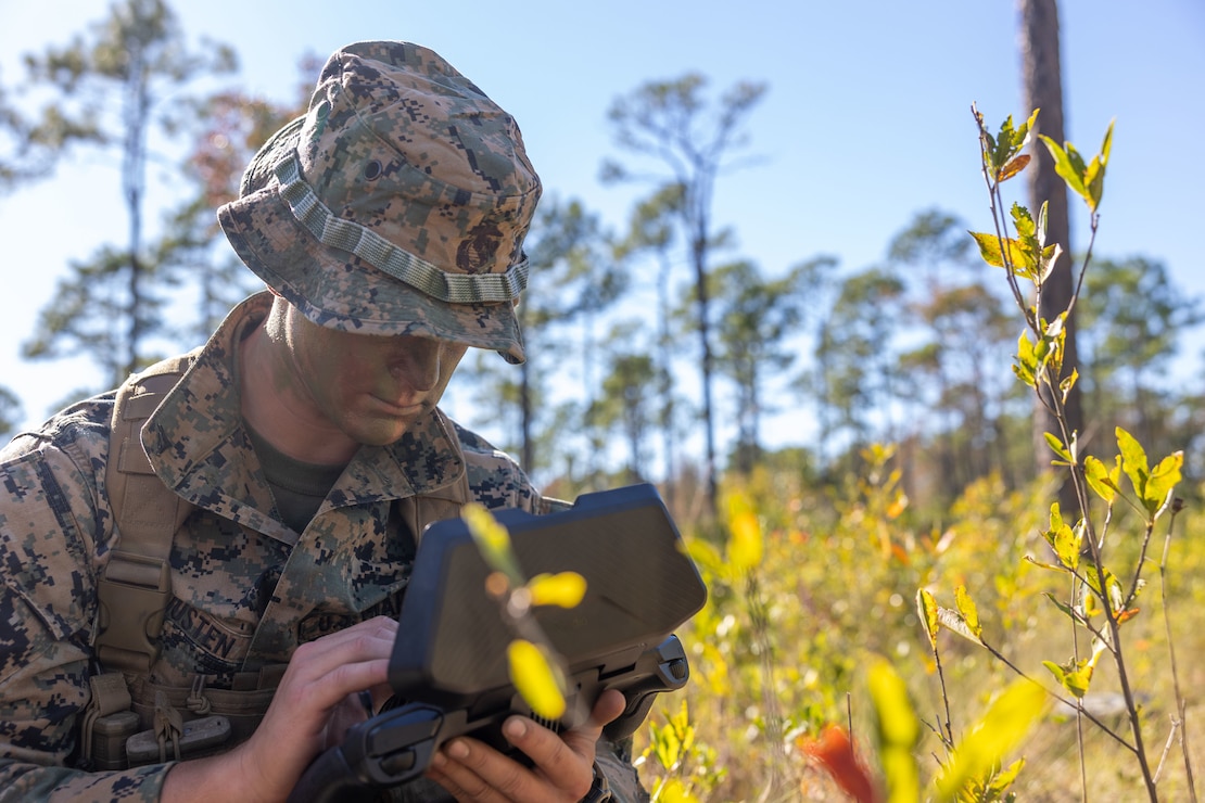 U.S. Marine Corps Lance Cpl. James Justen, a Mooresville, North Carolina native and a scout sniper assigned to Weapons Company, 2d Battalion, 2d Marine Regiment, uses a Small Unmanned Aircraft System (SUAS) to look for possible mechanized threats in the area during a reconnaissance and surveillance field exercise on Marine Corps Base Camp Lejeune, North Carolina, Oct. 5, 2022. The reconnaissance and surveillance exercise was conducted to prepare teams for the Battle Field Exercise Team Leader Evaluation and increase platform interoperability. (U.S. Marine Corps photo by Lance Cpl. Rafael Brambila-Pelayo)