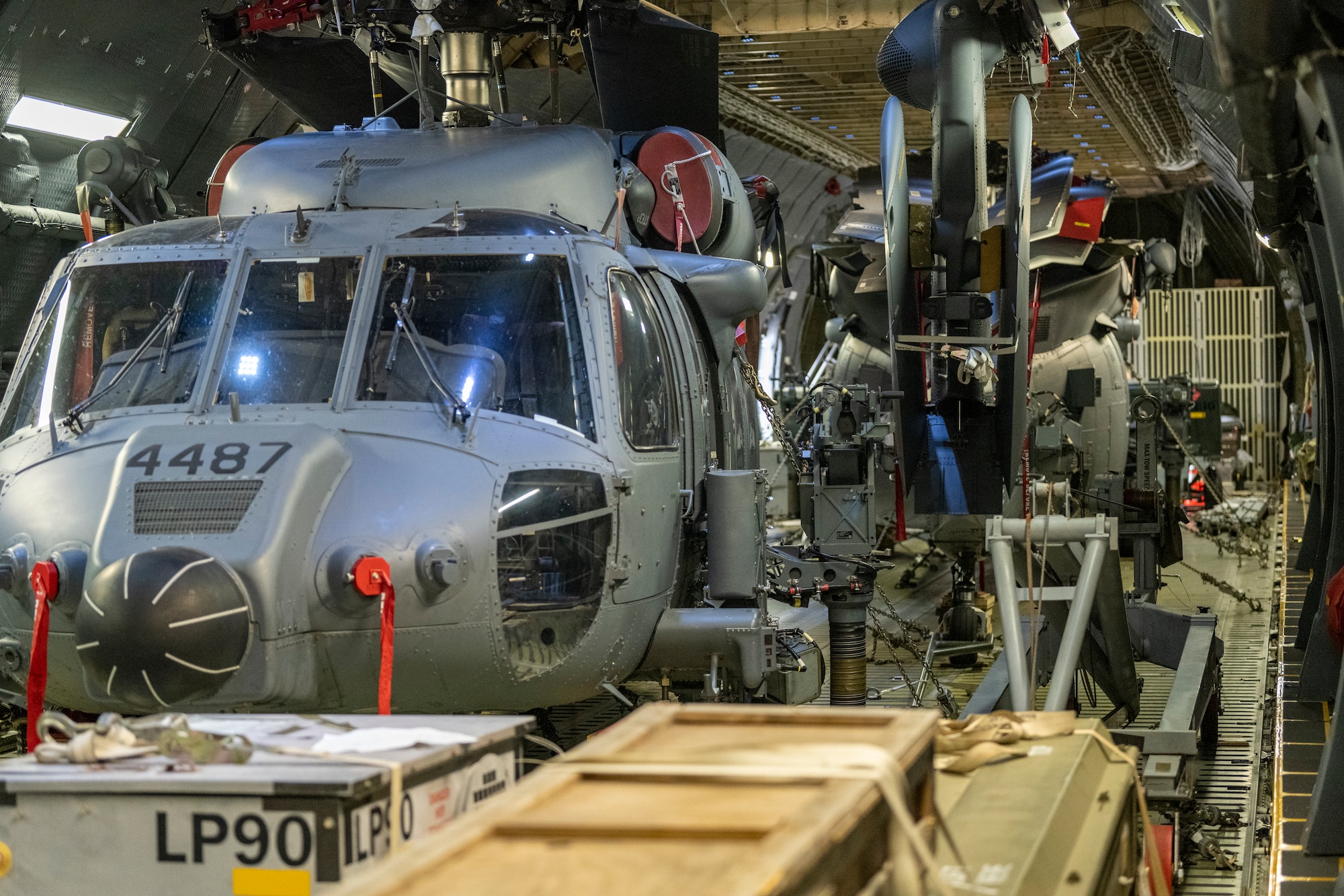 Two HH-60W helicopters in a C-5M Super Galaxy aircraft