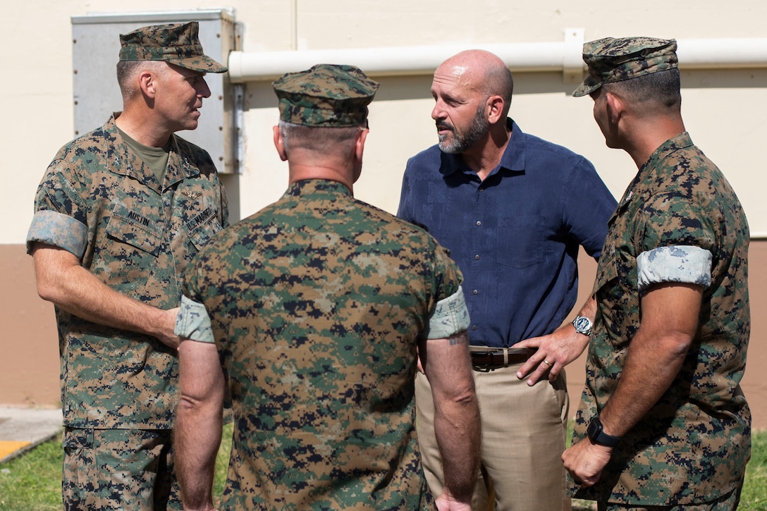 U.S. Marine Corps Maj. Gen. Eric Austin, left, commanding general, 1st Marine Aircraft Wing, speaks to Marine Corps Base Hawaii leadership during a visit to MCBH, Sept. 27, 2022. The purpose of the visit was to inform Austin on the base’s progression toward Force Design 2030. (U.S. Marine Corps photo by Lance Cpl. Isaiah Hill)