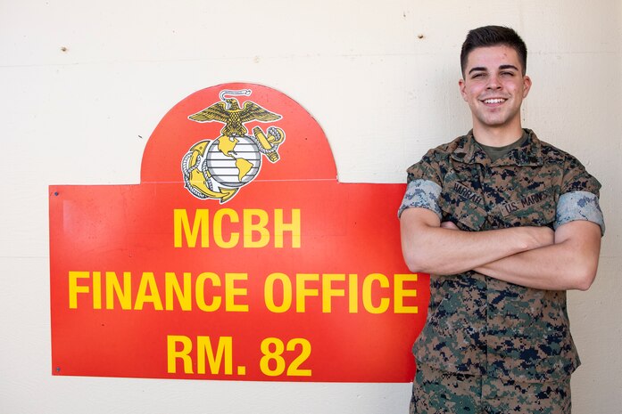 U.S. Marine Corps Sgt. Andrew Harrah, financial technician, Headquarters Battalion, Marine Corps Base Hawaii, poses for a photo, MCBH, Oct. 5, 2022. Harrah was able to rely on his Hispanic upbringing to overcome adversity during an unexpected career change from reconnaissance to financial technician. (U.S. Marine Corps photo by Cpl. Samantha Sanchez)