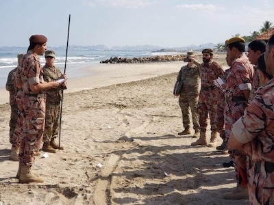 Members of 158th MEB Military Engagement Team 2 observe members of the Sultan of Oman’s Armed Forces in Oman during a subject matter expert exchange briefing. Maj. Gen. Kerry L. Muehlenbeck, director of Arizona’s Department of Emergency and Military Affairs, announced a new partnership between the Sultanate of Oman and the Arizona National Guard Oct. 13, 2022, through the Department of Defense National Guard Bureau State Partnership Program.