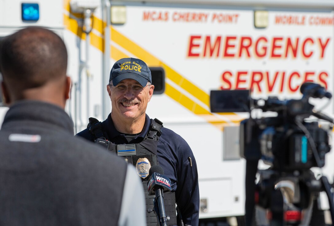2nd Lt. Brett Shaul, Marine Corps Air Station (MCAS) Cherry Point’s incident commander, gives an interview to Deric Rush, WITN News 7 reporter, during the Sudden Crisis 2022 training exercise at MCAS Cherry Point, North Carolina, Oct. 11, 2022.