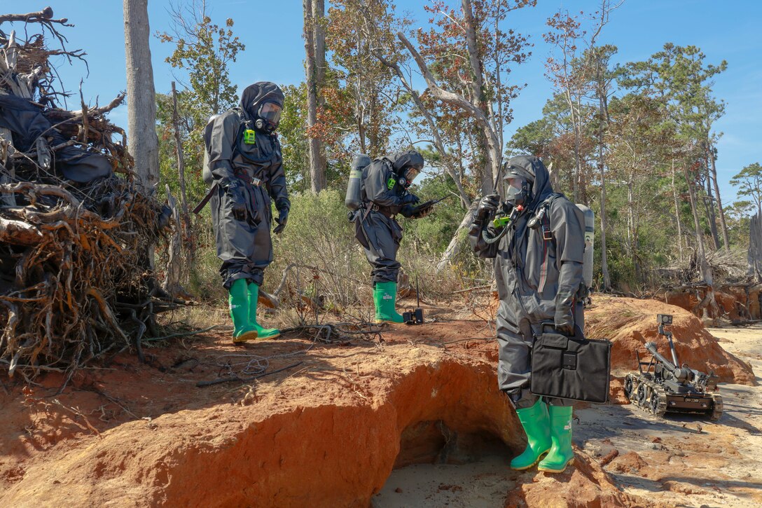 U.S. Marine Corps explosive ordnance disposal technicians, Headquarters and Headquarters Squadron, Marin Corps Air Station (MCAS) Cherry Point, respond to a simulated incident during the Sudden Crisis 2022 training exercise at MCAS Cherry Point, North Carolina, Oct. 11, 2022. The training event exercised command and control, reporting, interoperability with external organizations, and validated tactics, techniques and procedures, in the event the air station needs to elevate its force protection condition.  (U.S. Marine Corps photo by Lance Cpl. Tristen Reed)